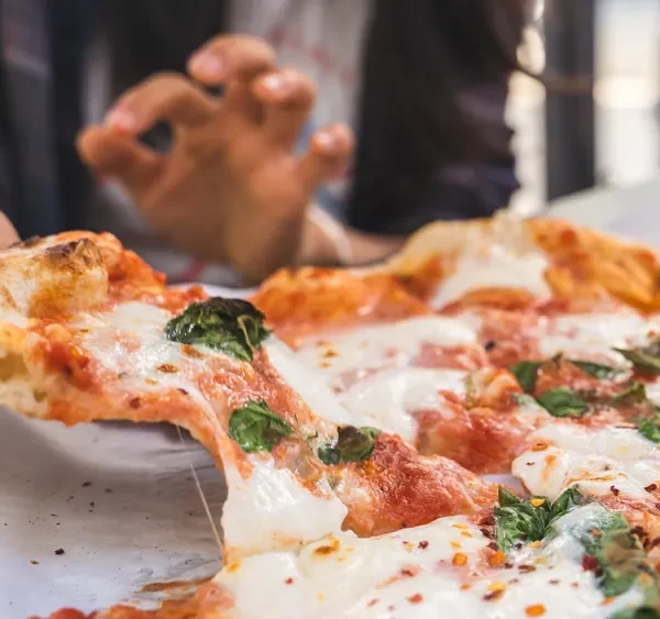 Delicious Italian pizza for lunch in the sun outside table in Napa California